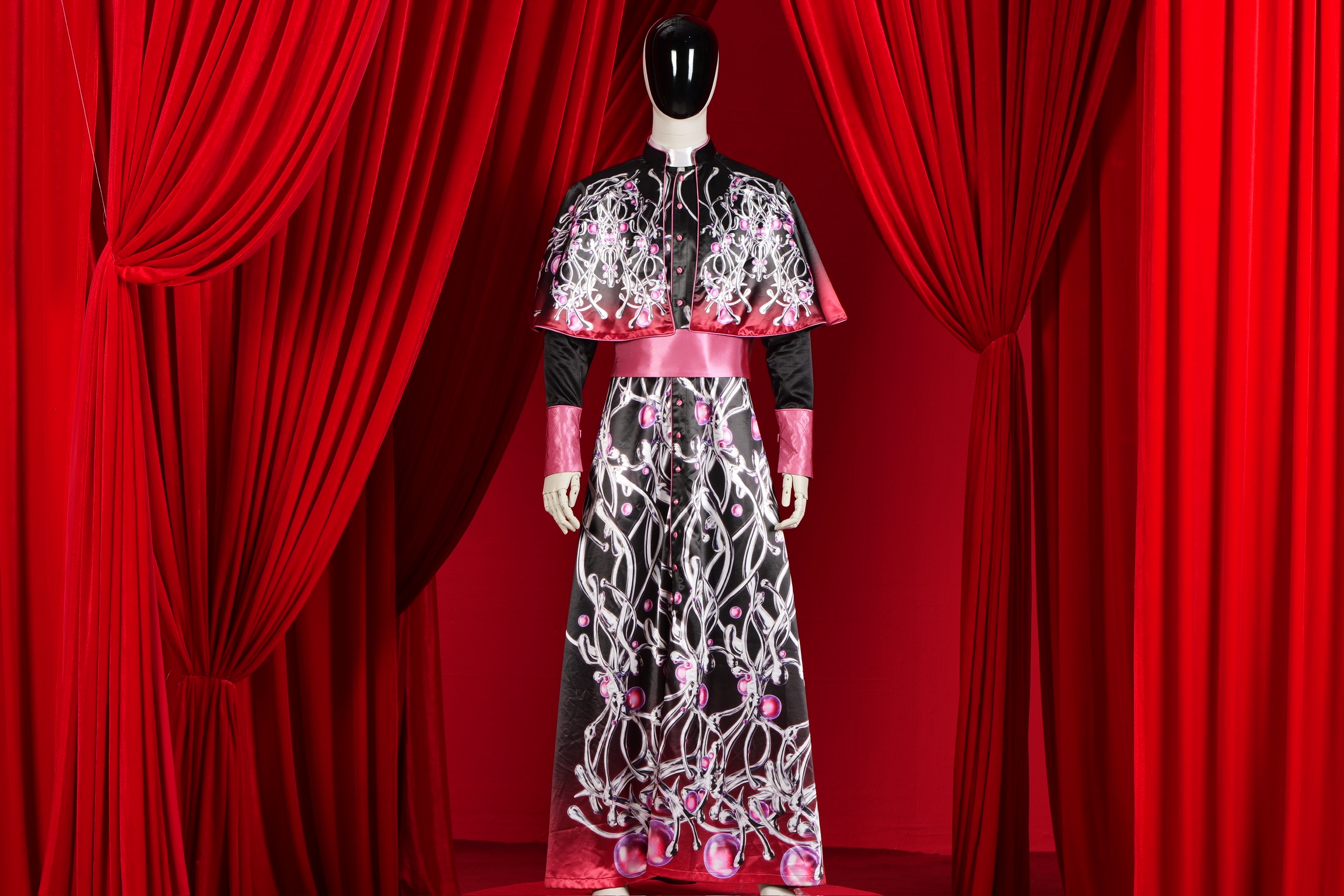 RELIQUARY: Floor-length vestment with biomechanical motif