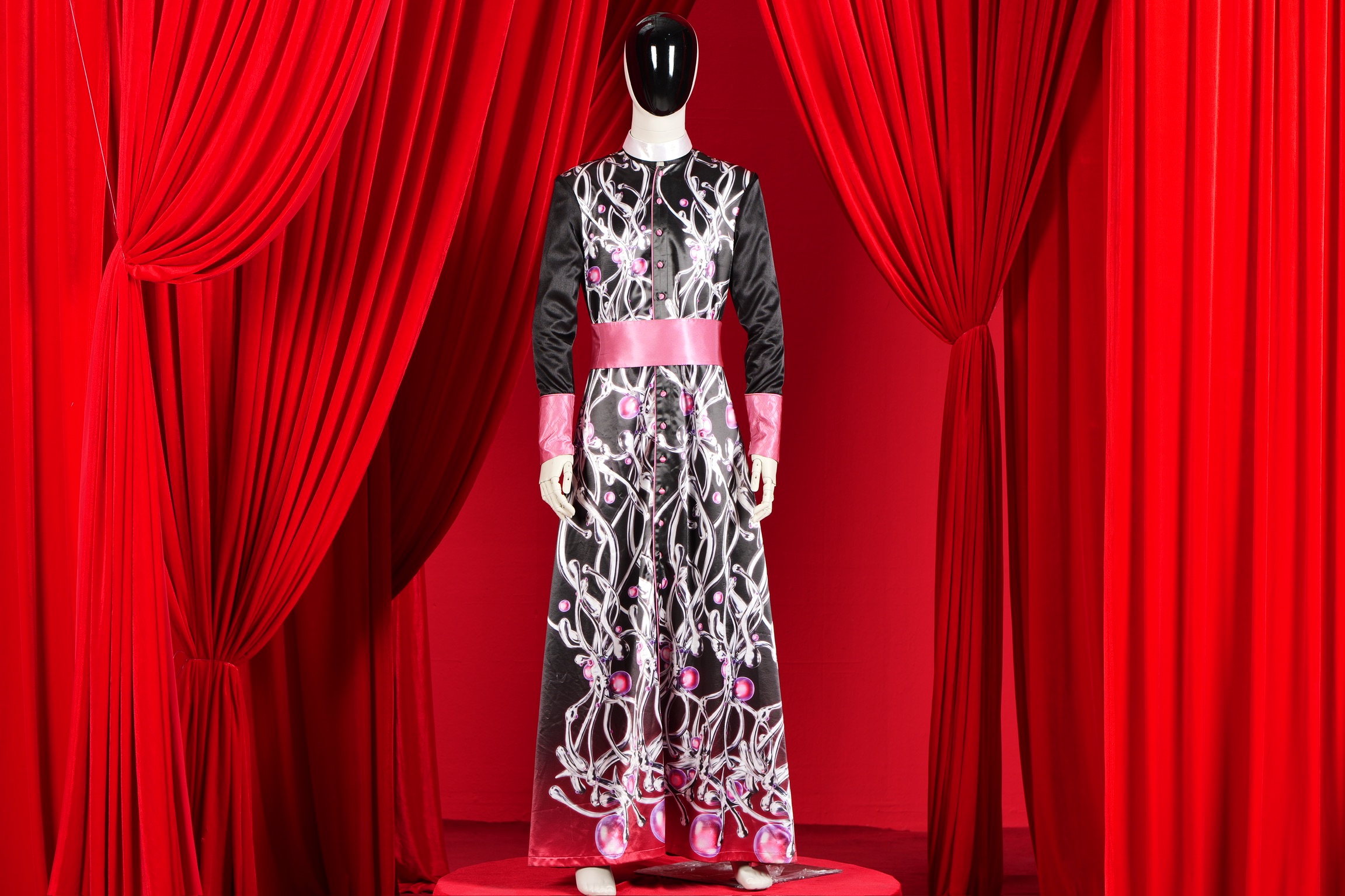 RELIQUARY on pedestal: biomechanical vestment with silver organic forms